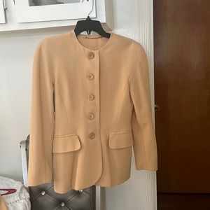 Gold vintage Escada suit jacket with thigh length skirt. Size 2.